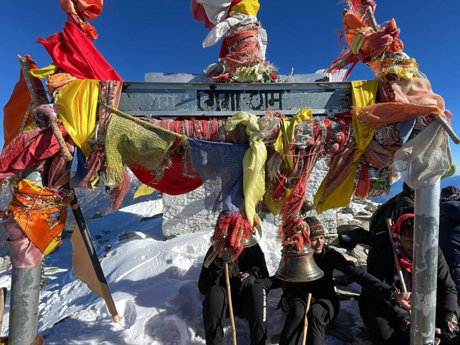 Breathtaking view of Tungnath Temple along the Chopta-Tungnath-Chandrashila trek, surrounded by snow-covered peaks.