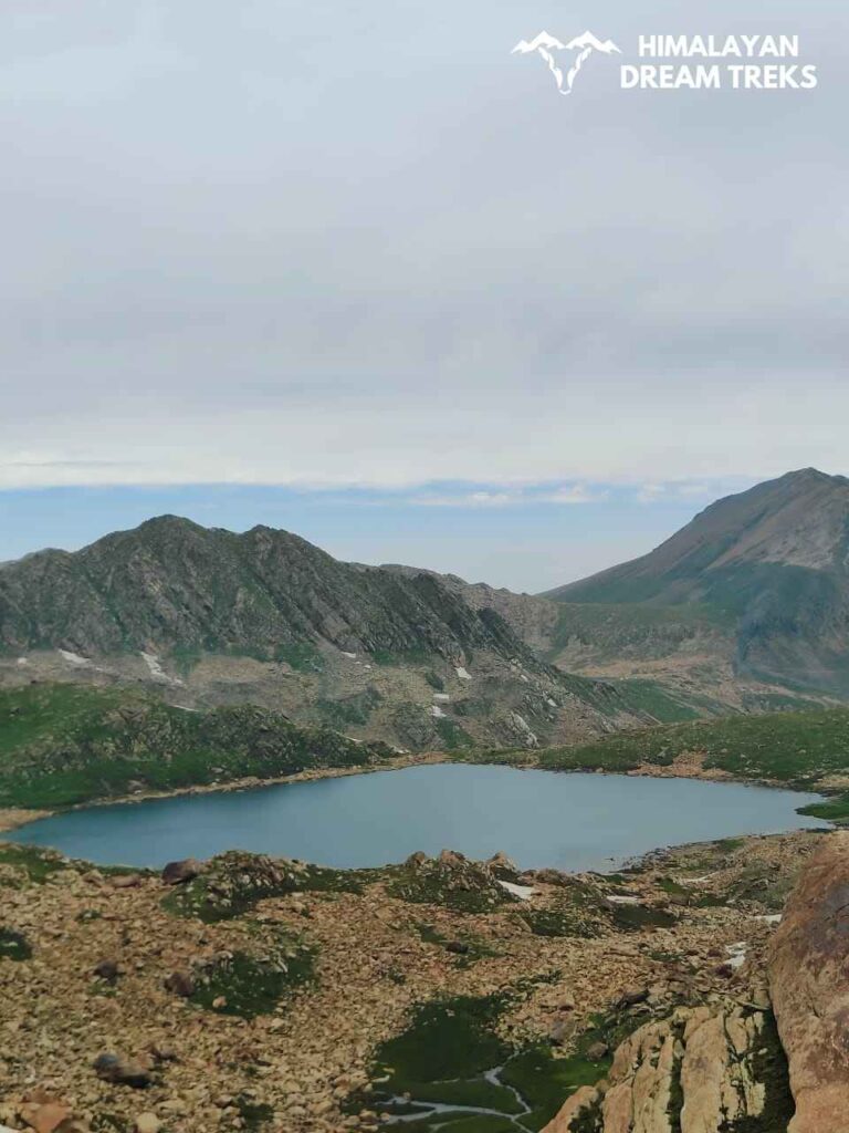 After crossing the stream, it will take approximately half an hour and a 3 km uphill climb to reach Chandansar Lake on the 6th day of the Pir Panjal Trek. This lake is almost the same size as Nandansar.