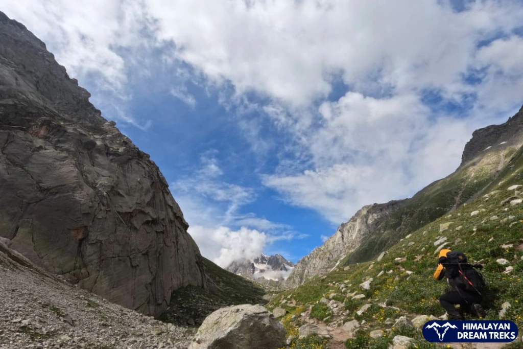 trekker clicking the picture during hampta pass