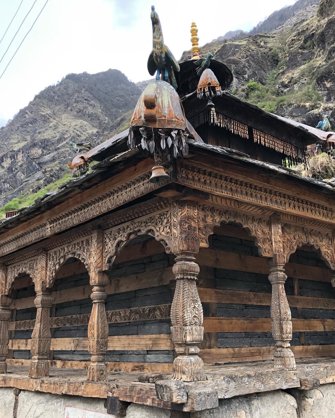 Osla Village with traditional houses set against Himalayan mountains