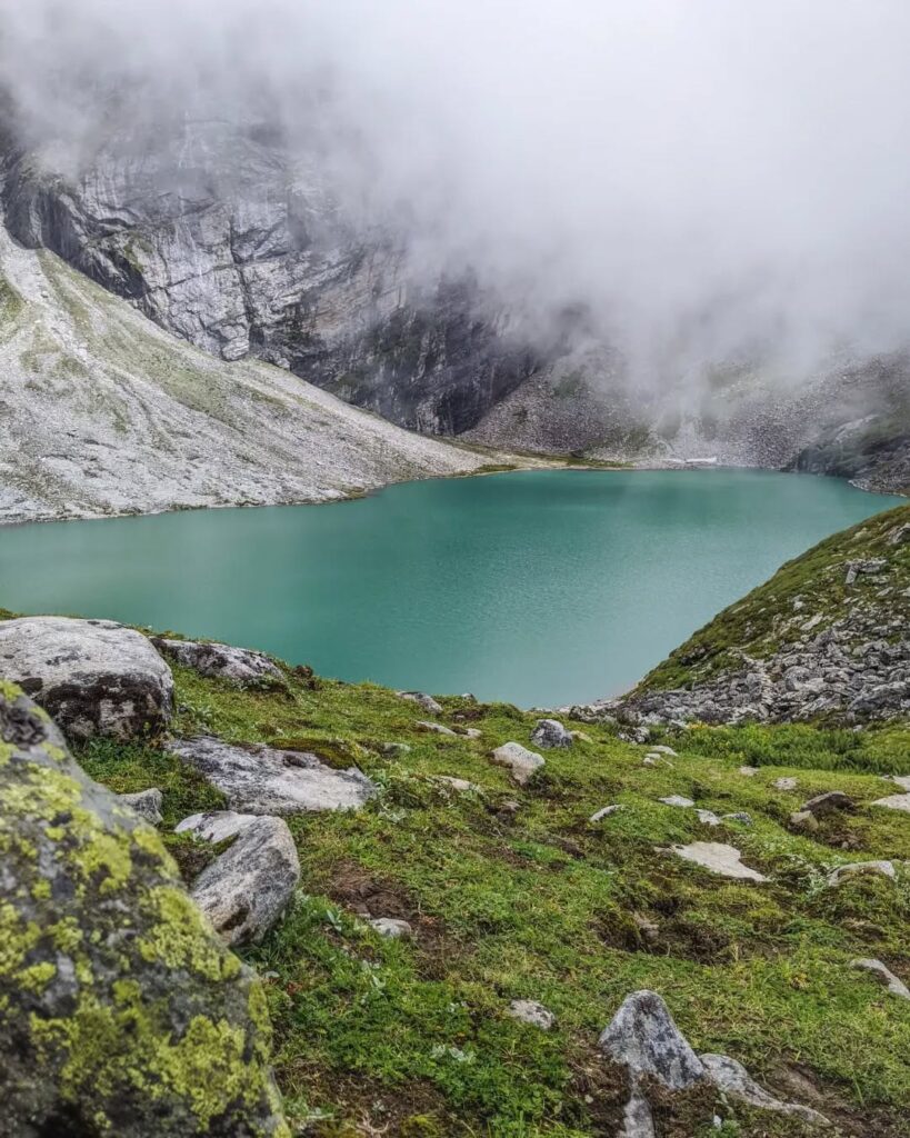 Crystal-clear Hemkund Lake in the Himalayas.
