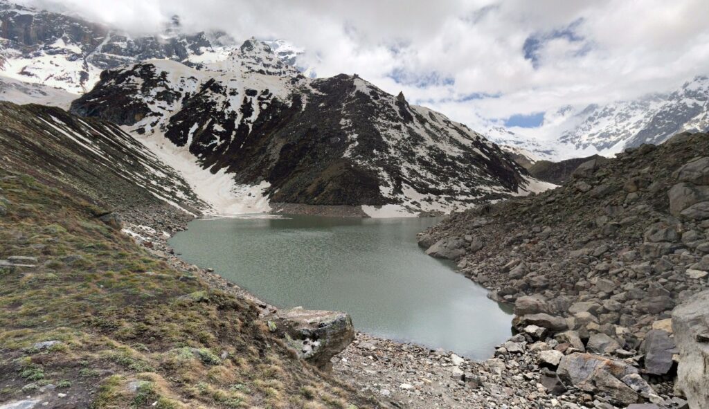 Satopanth Tal with glacial waters and barren ridges.