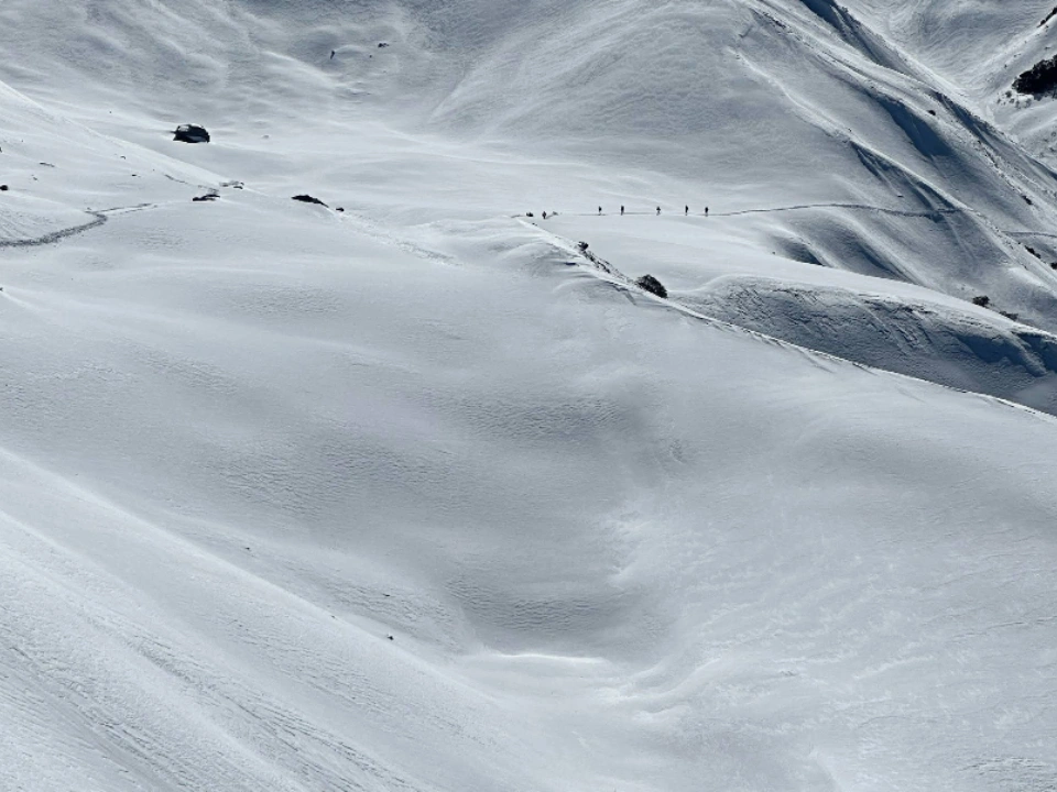 A vast blanket of snow near Kuari Pass, so inviting it feels like you could dive right in.