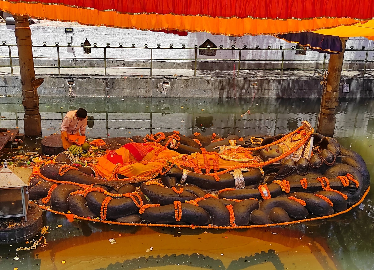 Stone statue of Lord Vishnu reclining at Budhanilkantha Temple, Kathmandu, Nepal