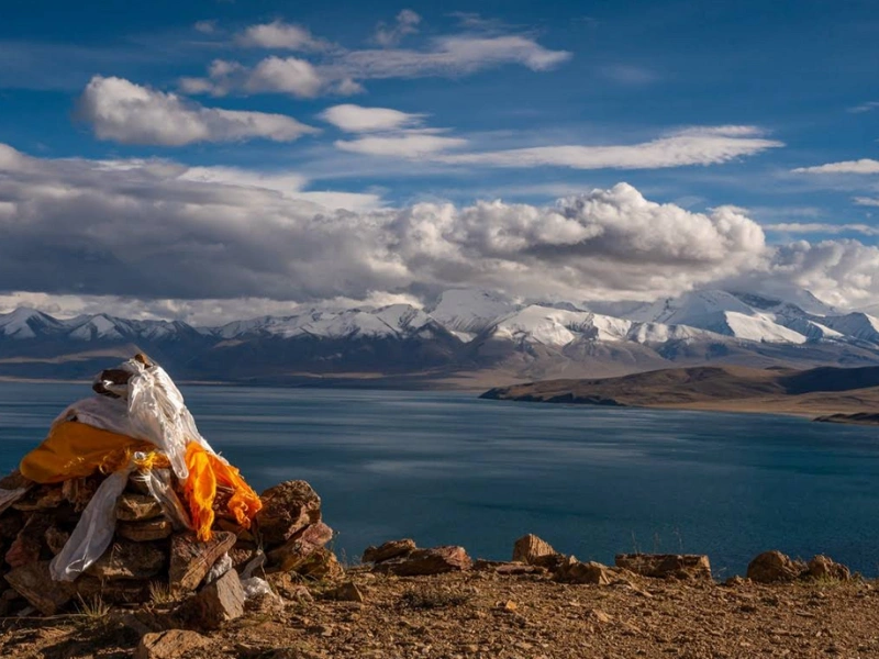 A serene view of Mansarovar Lake with crystal-clear blue waters