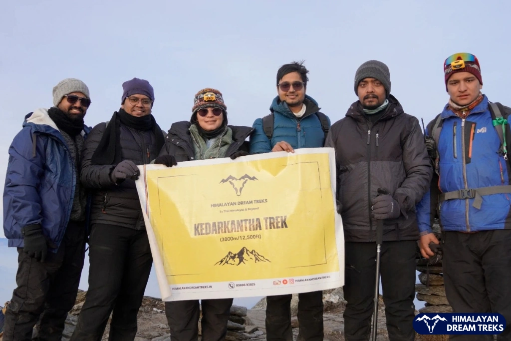 Trekkers posing together during Kedarkantha Trek