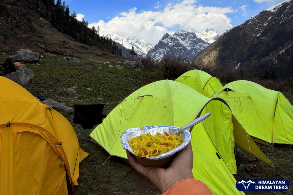 trekkers enjoying maggi in har ki dun campsite