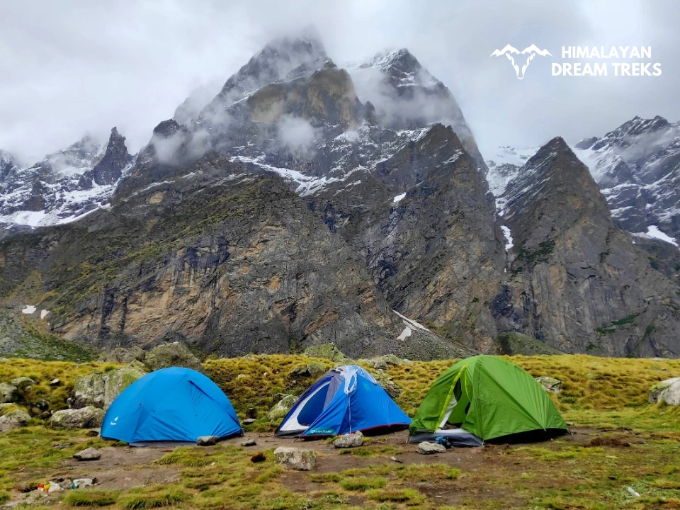 Camping tents set up on the Satopanth trail