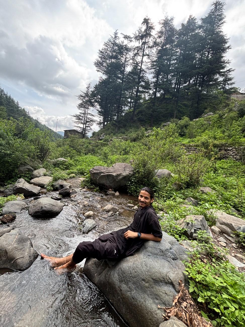 Taking a dip in water stream