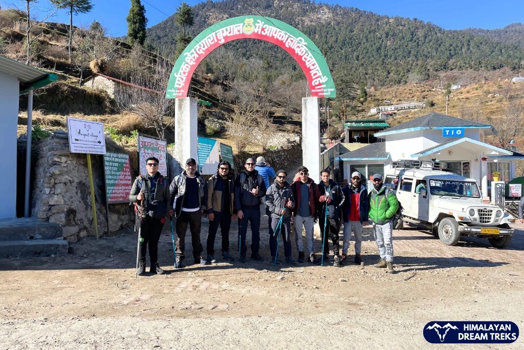 Trekkers gathering at the Dayara Bugyal entry gate before the trek