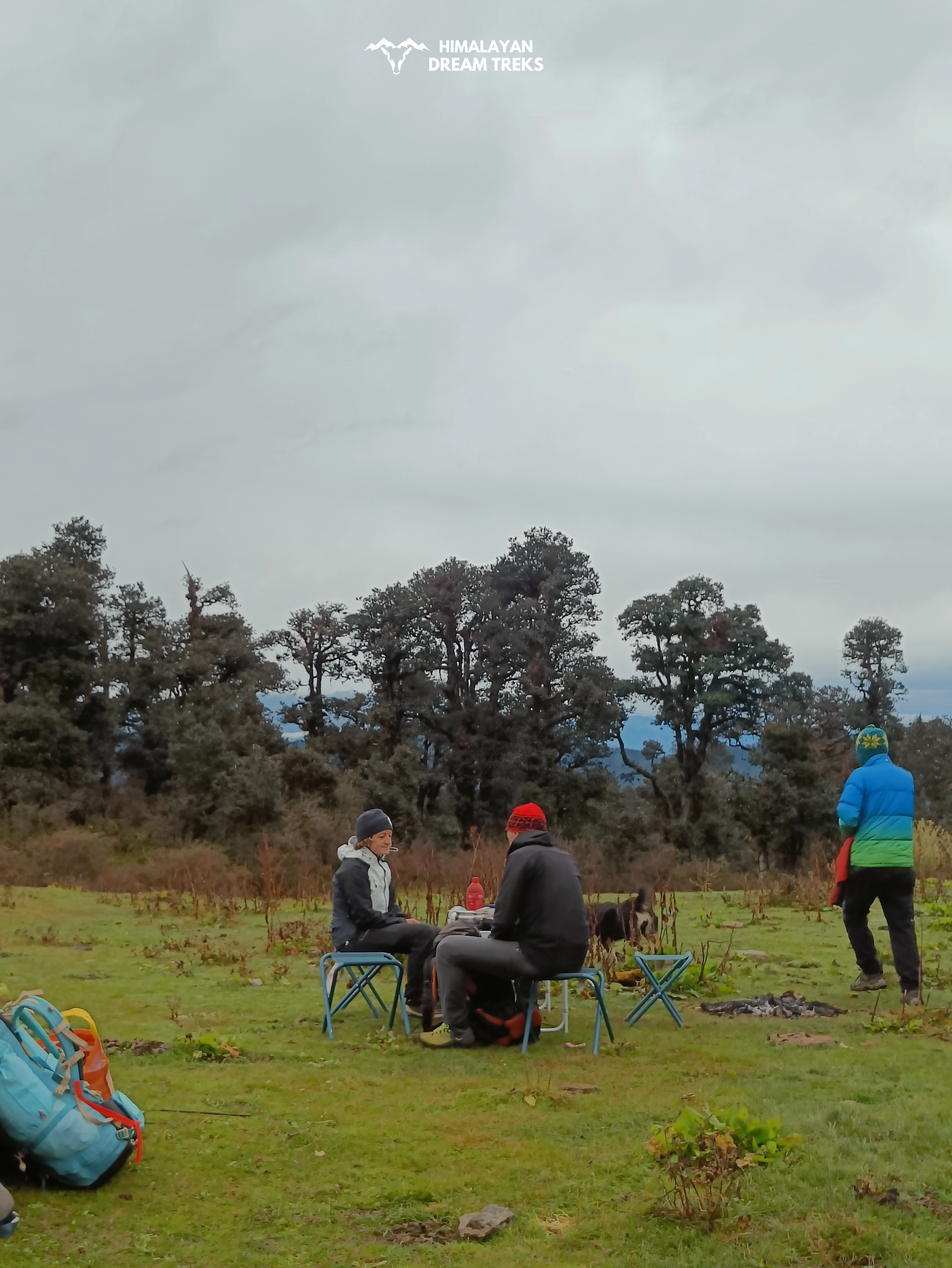 trekkers sitting on chairs at Panwali Kantha Bugya
